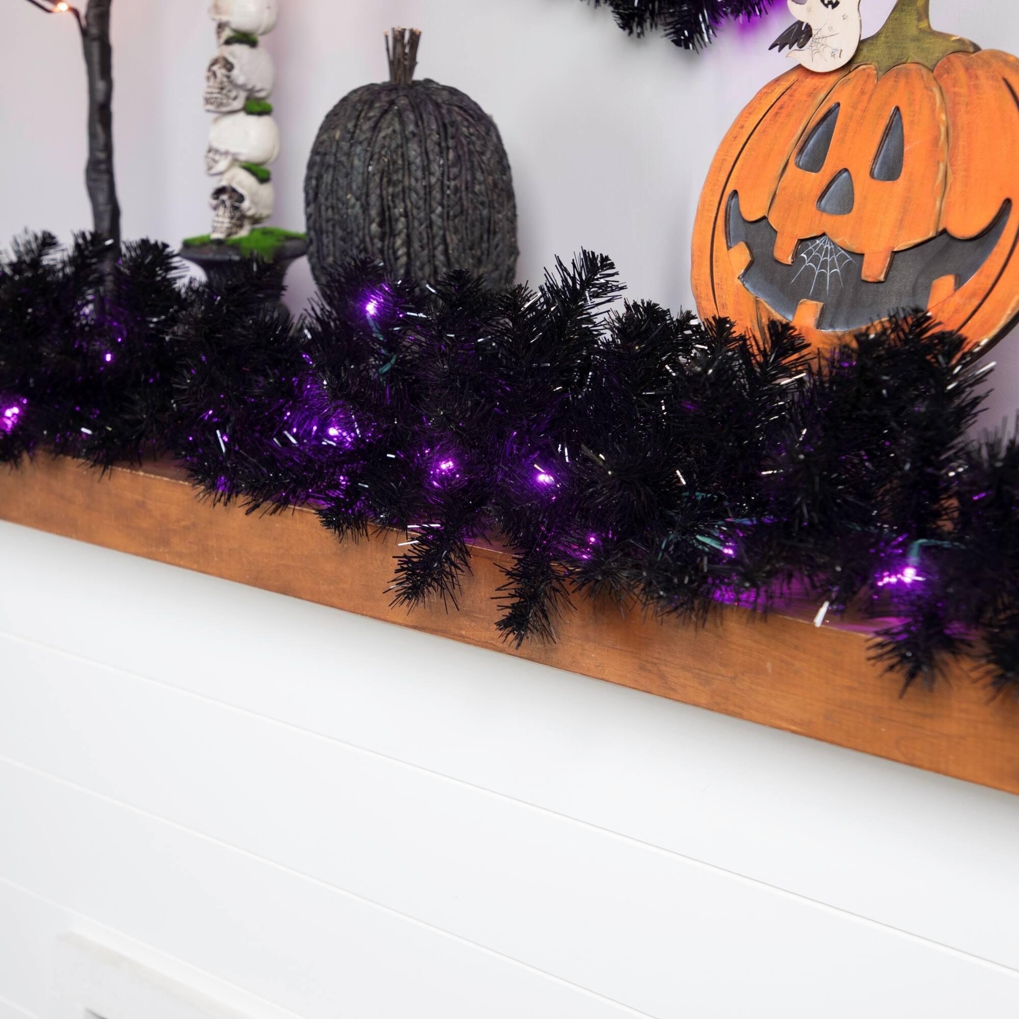 9ft. Purple LED Pre-Lit Black Crystal Pine Artificial Halloween Garland